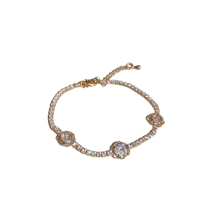 Elegant gold flower hollow bracelet with zircon stones and adjustable tennis chain for women