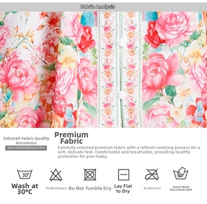Detail of pink floral fabric with white buttons and delicate cotton texture