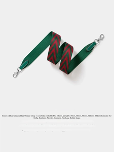 Detail of green and red chevron woven strap with silver metal buckles for crossbody bags
