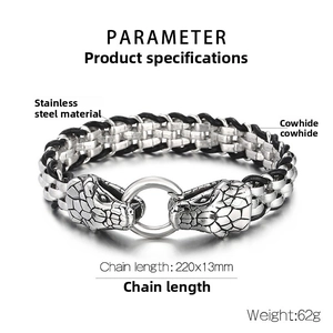 Macro detail of men's stainless steel bracelet with double snake heads and braided leather