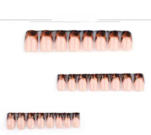 Detail view of square leopard print French tip press-on nails set on white background