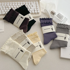 Set of ruffled cotton mid-calf socks for women in various vintage aesthetic colors