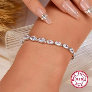 S925 sterling silver bracelet for women with oval zircon stones on wrist detail