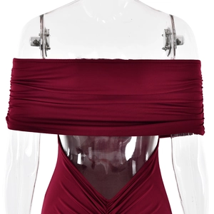 Close-up of wine red tube dress featuring elegant ruched detailing on the chest area