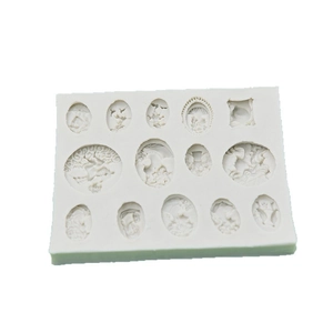 White silicone fondant mold with 14 vintage cameo portraits and classical relief patterns