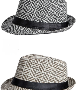 Detail showing woven straw fedora hats in black, white, and coffee check patterns