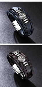 Vue macro de bracelets en cuir tressé multicouches avec charmes viking et fermoir magnétique