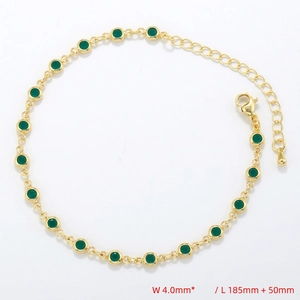 Detail view of gold-plated bracelet with green malachite-style stones and lobster clasp