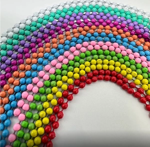 Close-up of vibrant rainbow-colored ball chains for DIY jewelry and keychain crafts