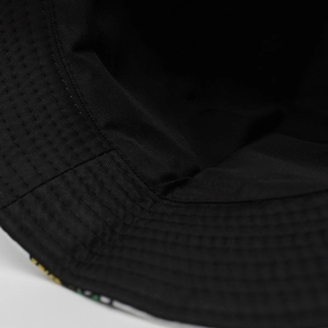 Close-up of internal stitching and durable twill fabric on the black bucket hat