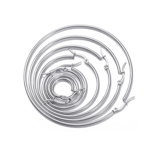 Five pairs of silver stainless steel hoop earrings in varying diameters with snap closure