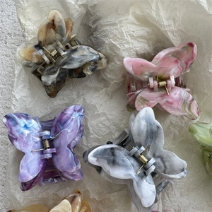 Eleganti mollette per capelli a farfalla in acetato con trama marmorea artistica