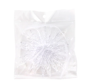 Macro shot of transparent crystal icicle ornaments packaged in an OPP self-adhesive bag