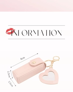 Pink faux leather lipstick case with heart mirror and gold keychain showing dimensions