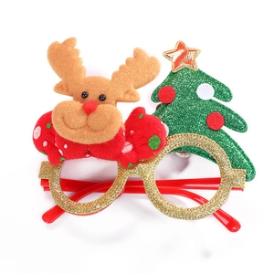 Christmas party glasses with glitter reindeer and sequin tree decor on red frame