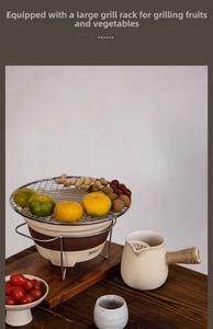 Japanese ceramic charcoal grill with large metal mesh roasting fruits and nuts