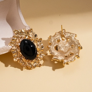 Vintage gold oval leaf earrings with black gemstone in elegant geometric baroque style
