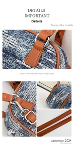 Close-up of sparkling silver sequins on blue denim and brown leather strap detail