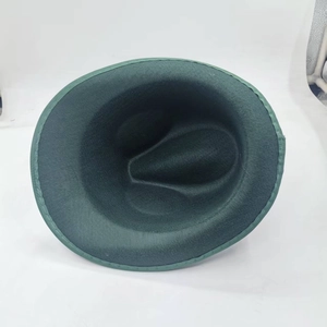 Classic dark green felt fedora hat with faux feather decoration in a retro jazz style