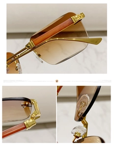 Macro detail of rimless sunglasses featuring wood grain temples and golden metal hinges