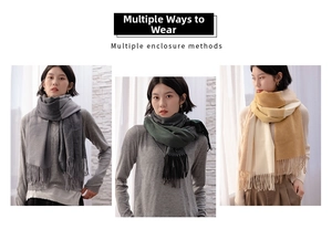 Detail showing multiple styling ways of gradient cashmere-feel scarves with soft fringes