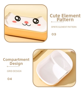 Detail of cute cat pattern lid and divided dual compartments for student lunch box