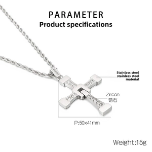 Macro detail of silver cross necklace with cubic zirconia inlay and 50x41mm size markings