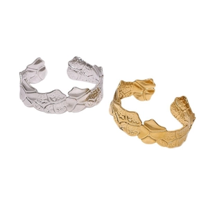 Textured gold and silver stainless steel open cuff bracelets with organic scale patterns