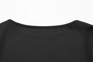 Close-up of the elegant crew neckline on a black knitted slim-fit dress with fine stitching