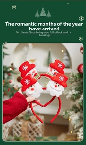 Detail of Christmas headbands featuring Santa Claus and snowman with plush red fabric