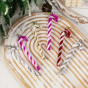 Set of 6 glittery Christmas candy cane ornaments in colorful spiral designs on wood tray