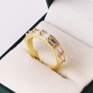 Luxury 18K gold plated ring with double row rectangular zircons in a jewelry box