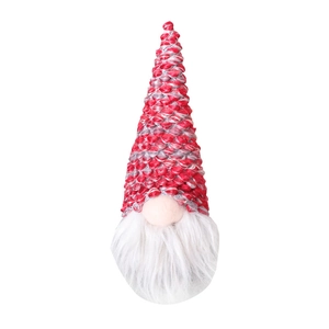 Red and grey knitted Christmas gnome plush decoration with white beard on white background