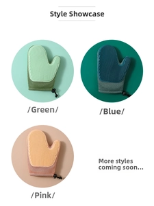 Close-up of silicone pet grooming gloves in green, blue, and pink for bathing and massage