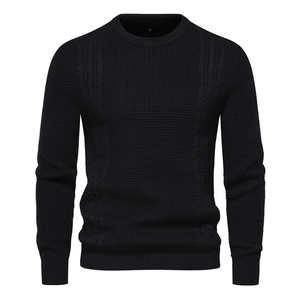 Men's black waffle knit sweater with crew neck and braided cable patterns on long sleeves