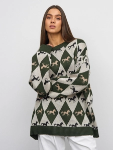 Detail of crew neck knit sweater featuring green and cream Argyle pattern with horse motifs