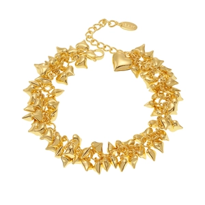 Polished gold stainless steel heart pendant bracelet with a secure lobster clasp