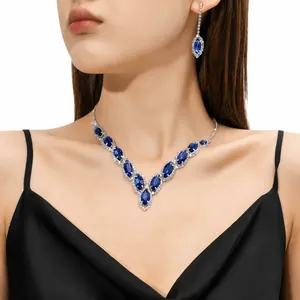 Close-up of sapphire blue crystal bridal necklace set with marquise-cut stones