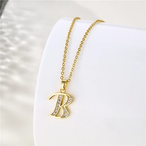 18K gold plated necklace featuring a zircon encrusted B-letter pendant on a display