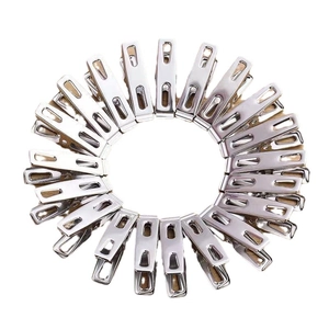 Set of stainless steel heavy-duty windproof laundry pegs in a circular arrangement
