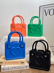 Colorful EVA beach handbags with embossed heart pattern in square silhouette