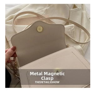 Detailed close-up of a beige PU leather crossbody bag with light gold magnetic snap closure