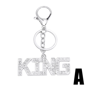 Silver metal KING letter keychain with sparkling rhinestones and crown detail charms