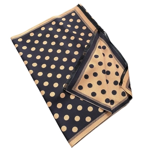 Vintage retro polka dot scarf with reversible double-sided pattern and fringe edges