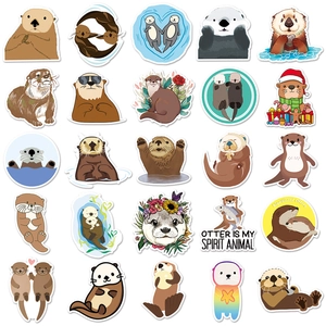 Detailed flat lay of waterproof cartoon otter stickers for scrapbooking and decoration