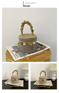 Detail of khaki sparkling rhinestone cylinder evening bag with gold chain strap