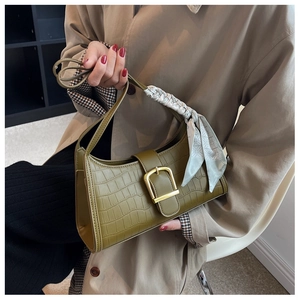 Chic olive green baguette bag with crocodile texture, gold D-ring and silk scarf detail