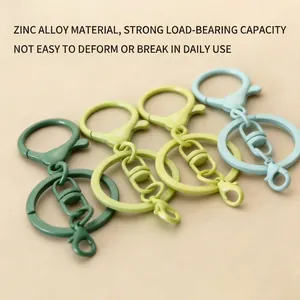 Colorful zinc alloy lobster clasp keychains with figure-8 swivels in four green shades