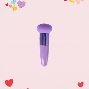 Detail of purple makeup sponge with handle for precise foundation and contouring application