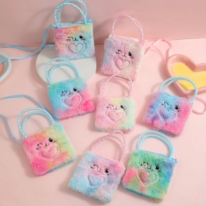 Detail of plush rainbow cat crossbody bag with heart embroidery and soft texture